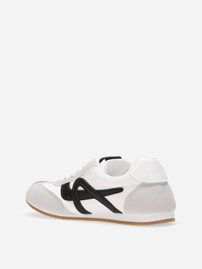 Baskets basiques bicolores blanches