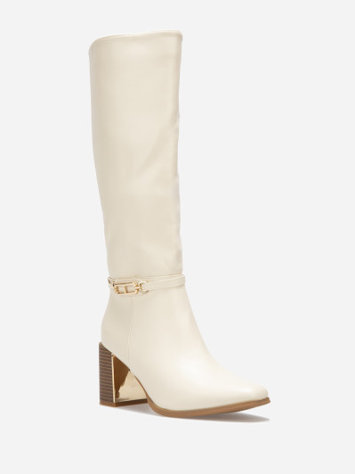 Bottes beiges à talon et détail métalliques