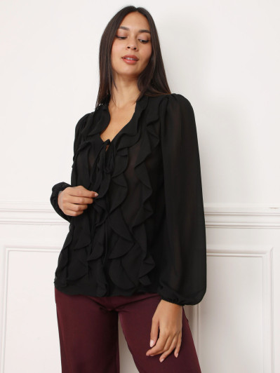 Blouse noire à volants et manches bouffantes