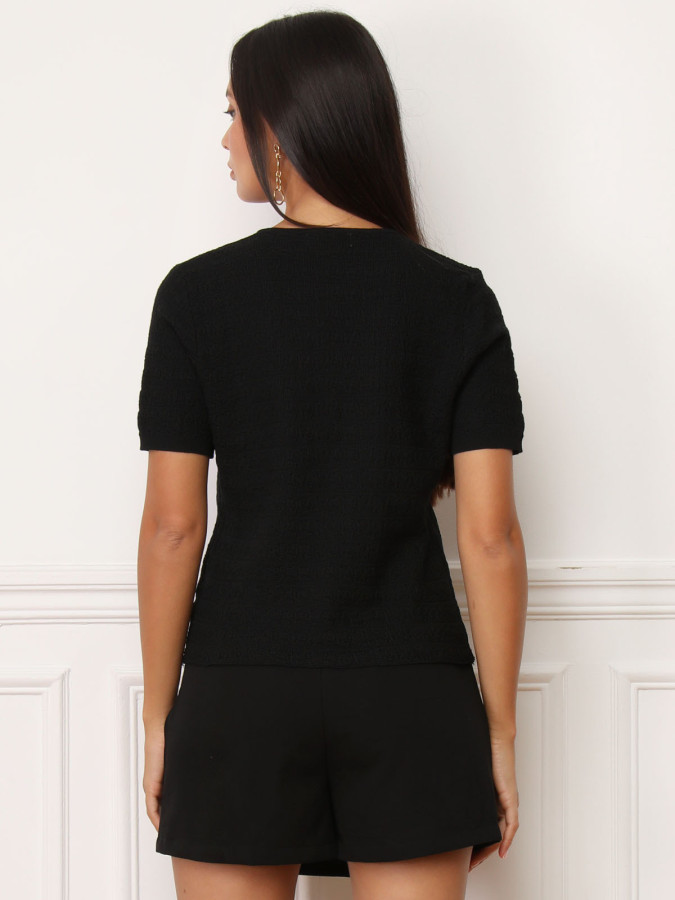 Top texturé noir à boutons dorés