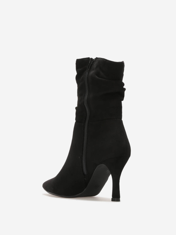 Bottines slouchy en suédine à talon aiguille