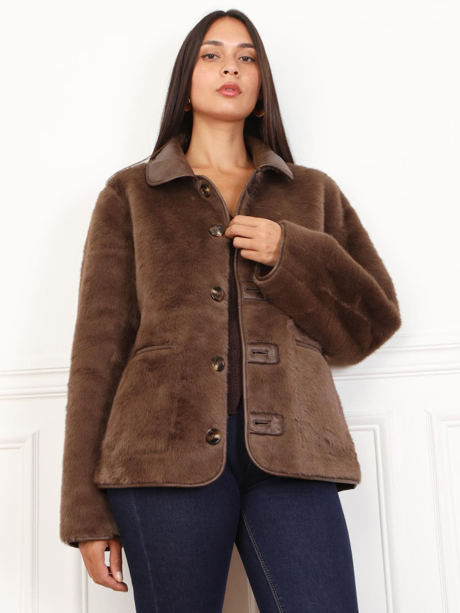 Blouson réversible fausse fourrure avec poches