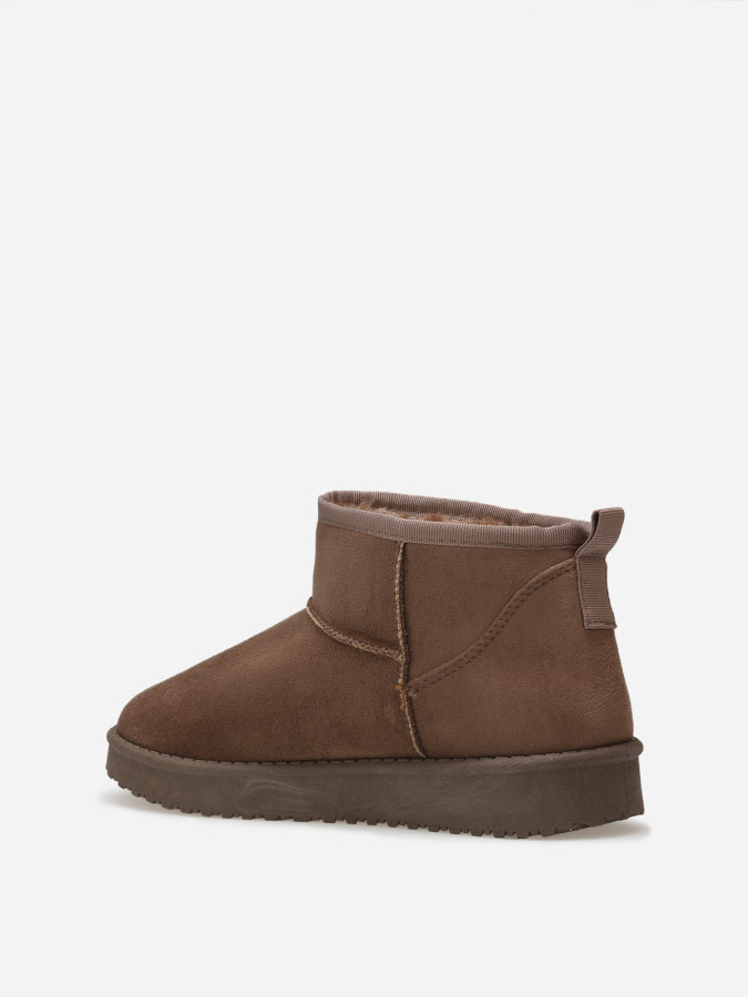 Boots basses en suédine fourrées