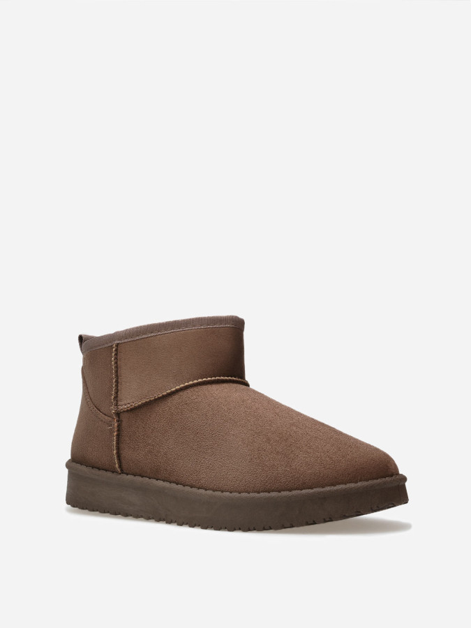 Boots basses en suédine fourrées