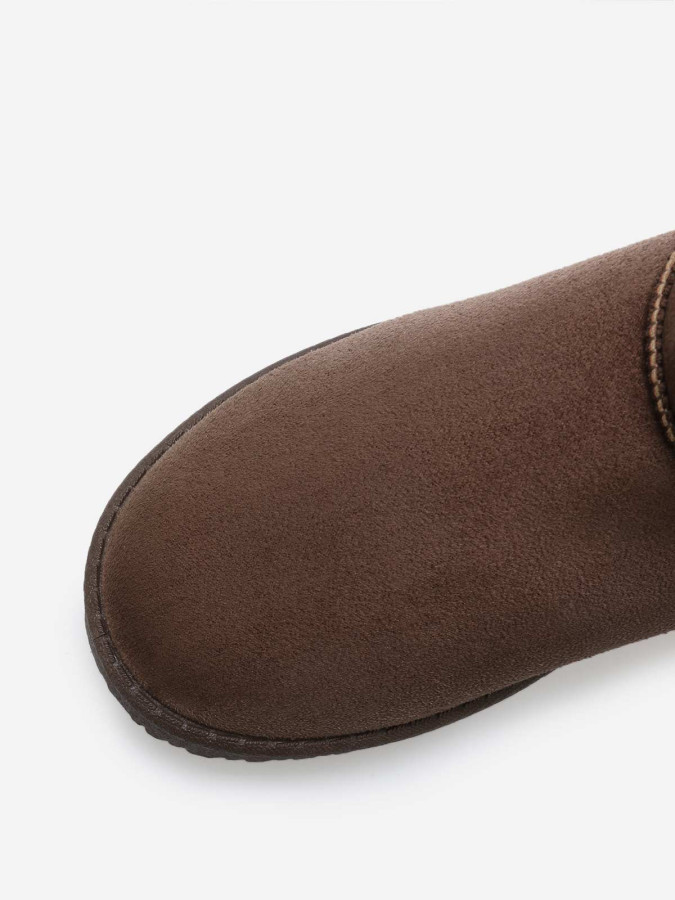 Boots basses en suédine fourrées