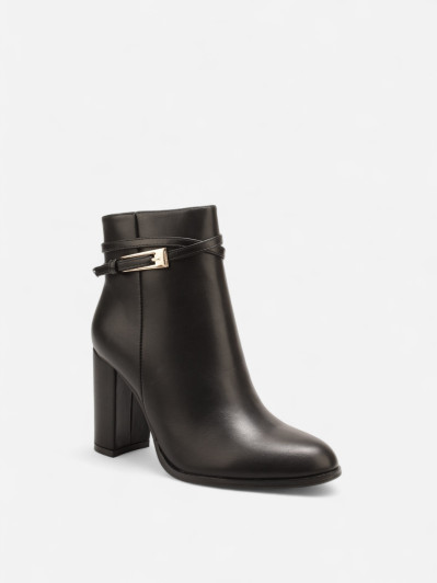 Bottines noires avec bride ceinture