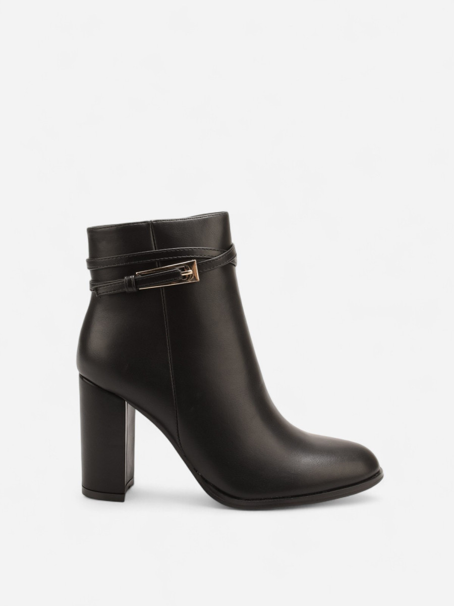 Bottines noires avec bride ceinture