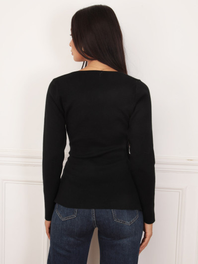 Top cache-cœur noir avec bijou coquillage