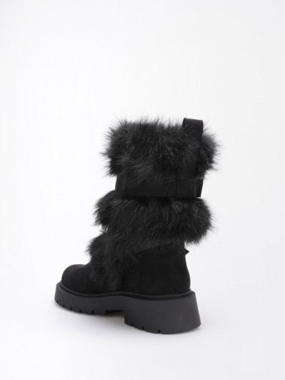 Bottes fausse fourrure noires et brides à boucles