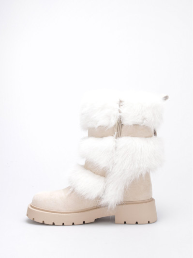 Bottes fausse fourrure beige et brides à boucles