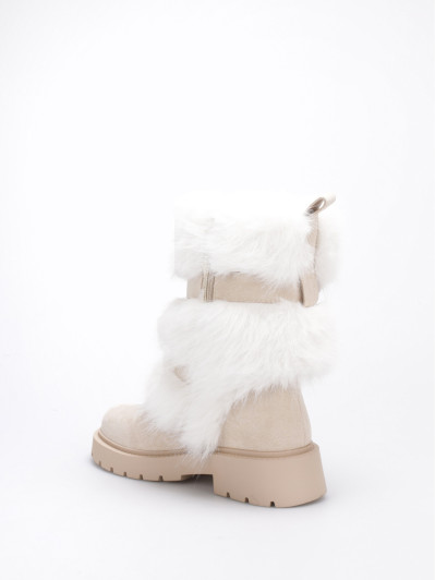 Bottes fausse fourrure beige et brides à boucles