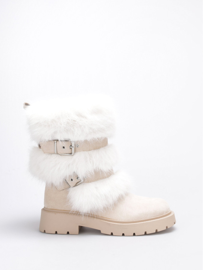 Bottes fausse fourrure beige et brides à boucles