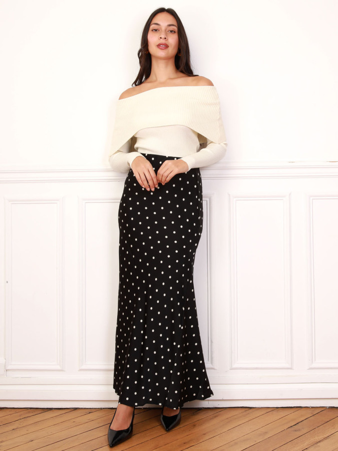 Jupe noire satinée à motifs pois
