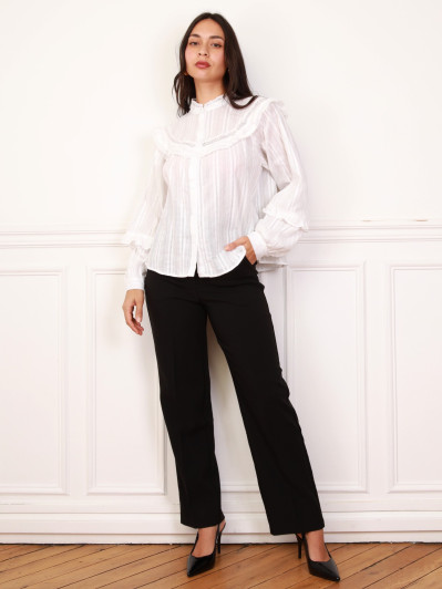 Chemisier blanc à manches bouffantes et volants