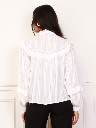 Chemisier blanc à manches bouffantes et volants