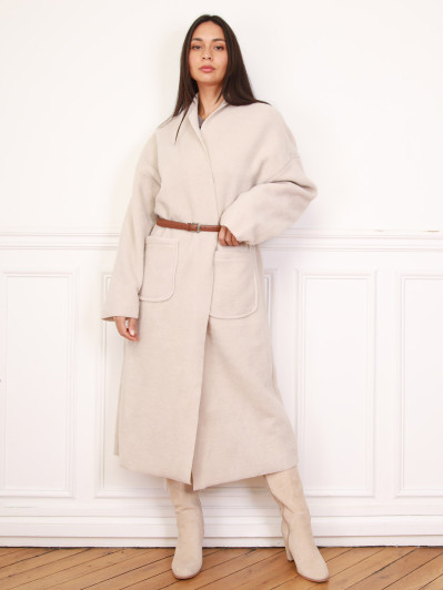 Gilet long en maille bouclette beige et à poches