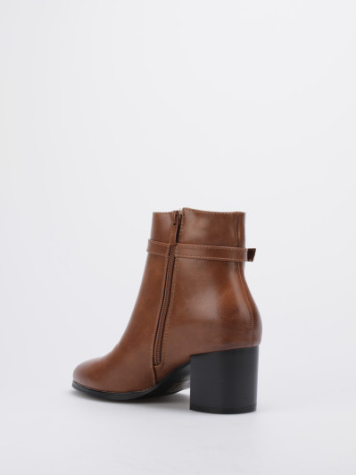 Bottines à talon et bride décorative