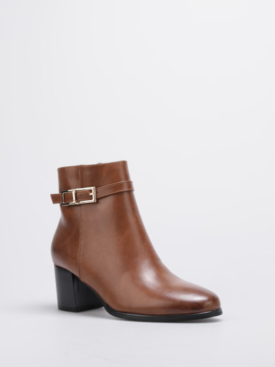 Bottines à talon et bride décorative