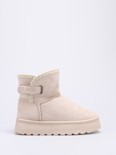 Boots beiges fourrées à bride et plateforme