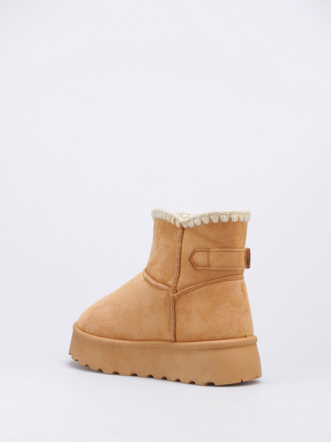 Boots camel fourrées à bride et plateforme