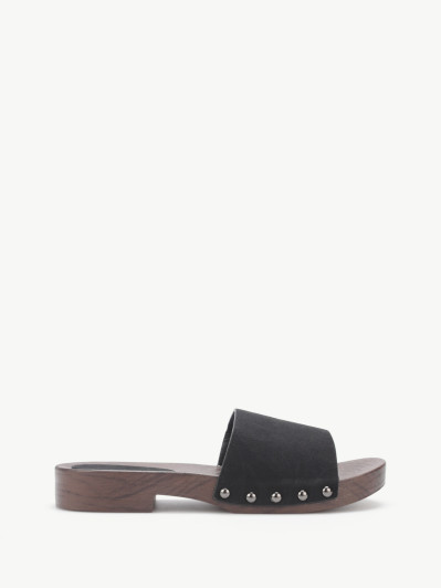 Mules sabots cloutées en suédine noires