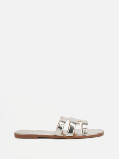 Mules plates à bride ajourée dorées