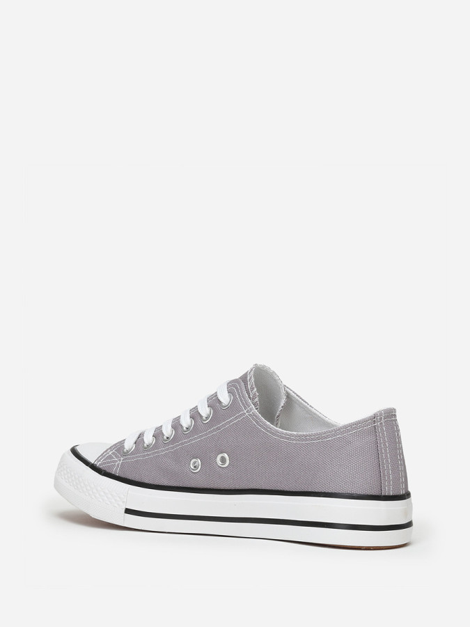 Tennis basses grises en toile