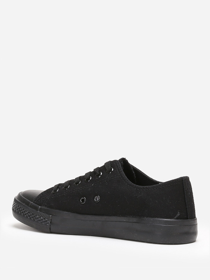 Tennis basses noires en toile