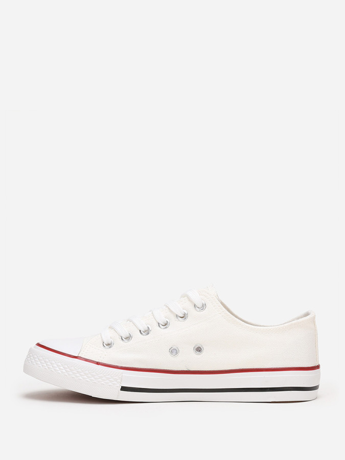 Tennis basses blanches en toile