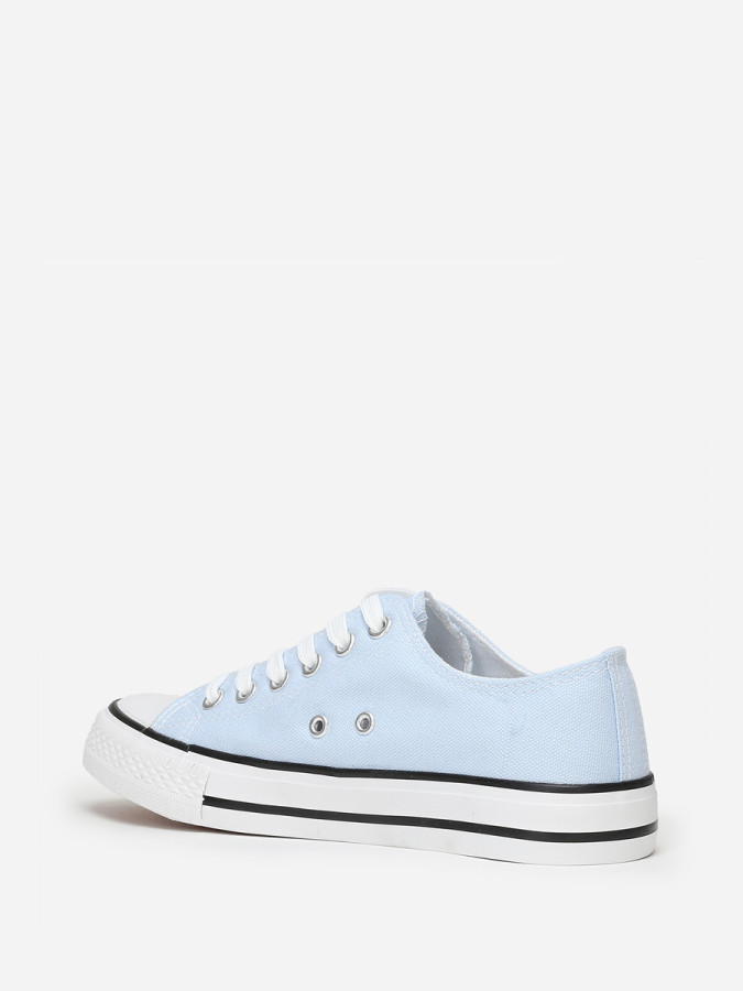 Tennis basses bleu clair en toile