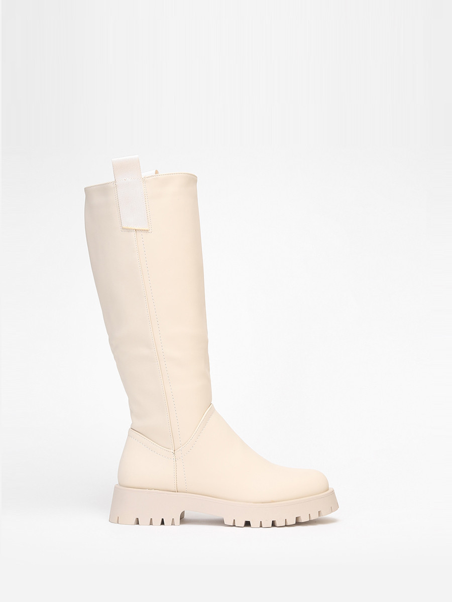 Bottes de pluie beiges à plateforme crantée