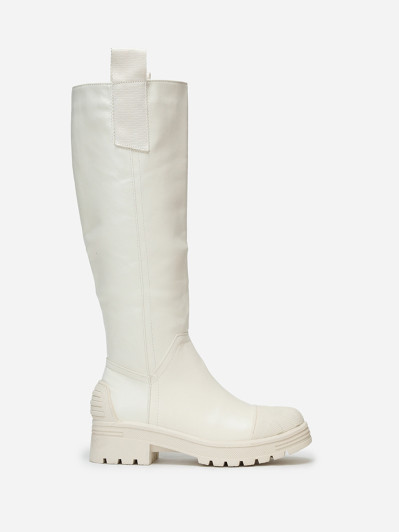 Bottes crèmes crantées avec motifs en relief