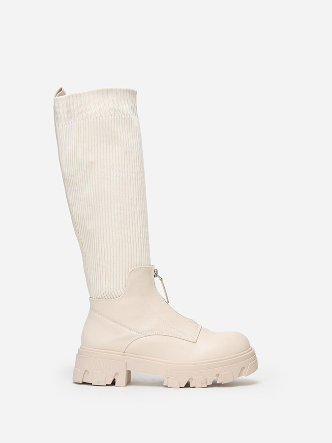 Bottes chaussettes beiges zippées devant