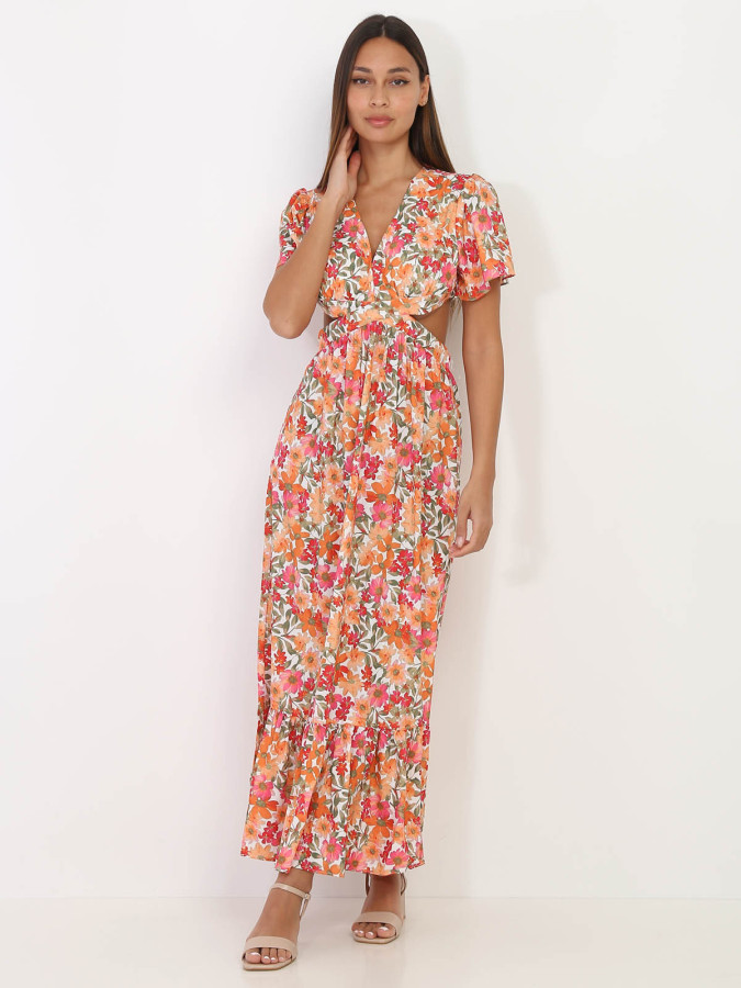 Robe longue blanche à fleurs orange avec découpes