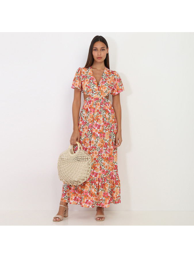 Robe longue blanche à fleurs orange avec découpes