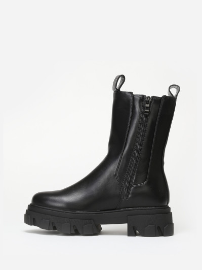 Bottines style chelsea noires à semelle crantée