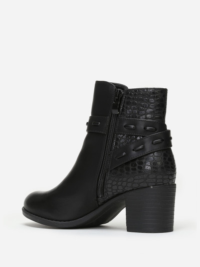 Bottines bi-matières noires avec bride à boucle
