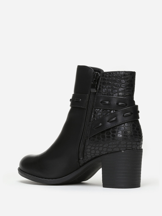 Bottines bi-matières noires avec bride à boucle