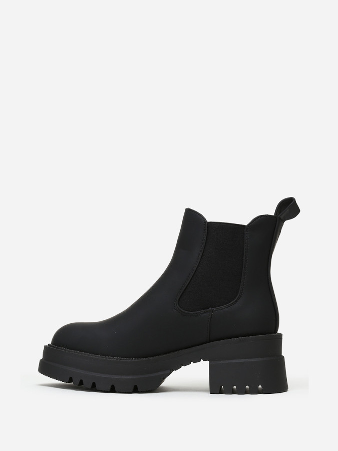 Chelsea noires à talon et plateforme crantés