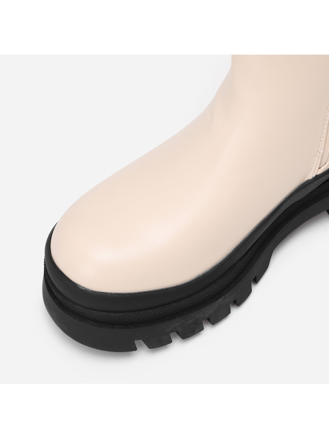 Bottines chelsea beiges en simili crantées