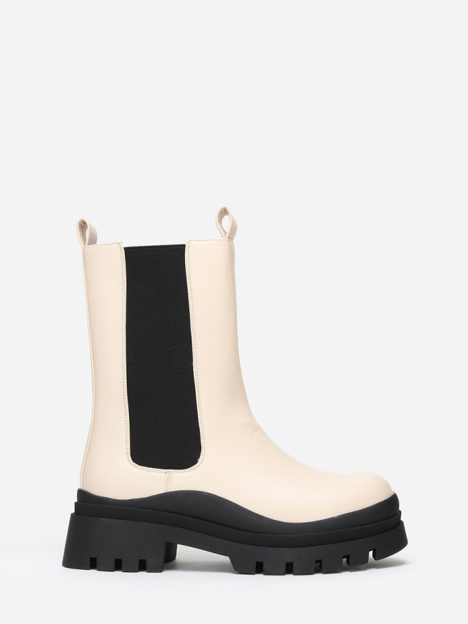 Bottines chelsea beiges en simili crantées