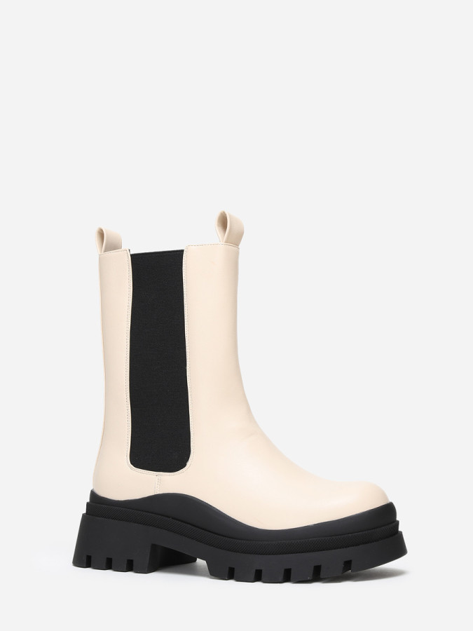 Bottines chelsea beiges en simili crantées