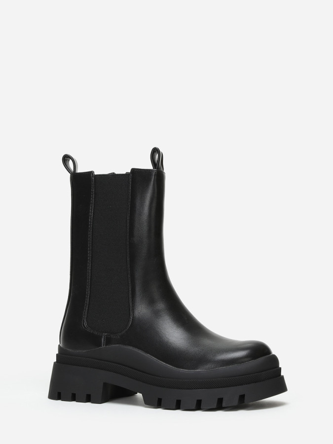 Bottines chelsea noires en simili crantées