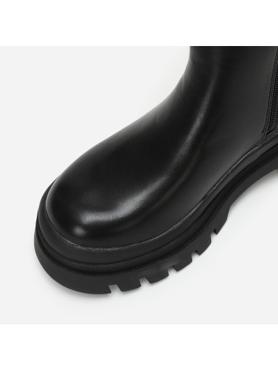 Bottines chelsea noires en simili crantées