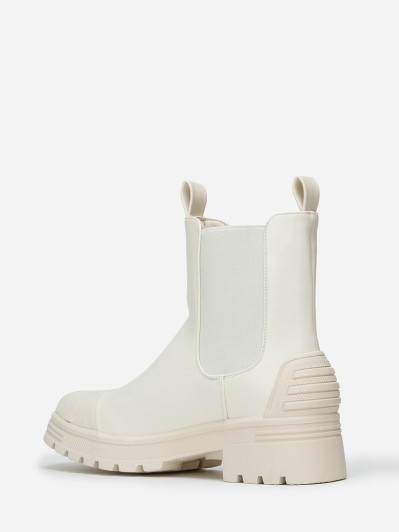 Chelsea crèmes crantées avec motifs en relief