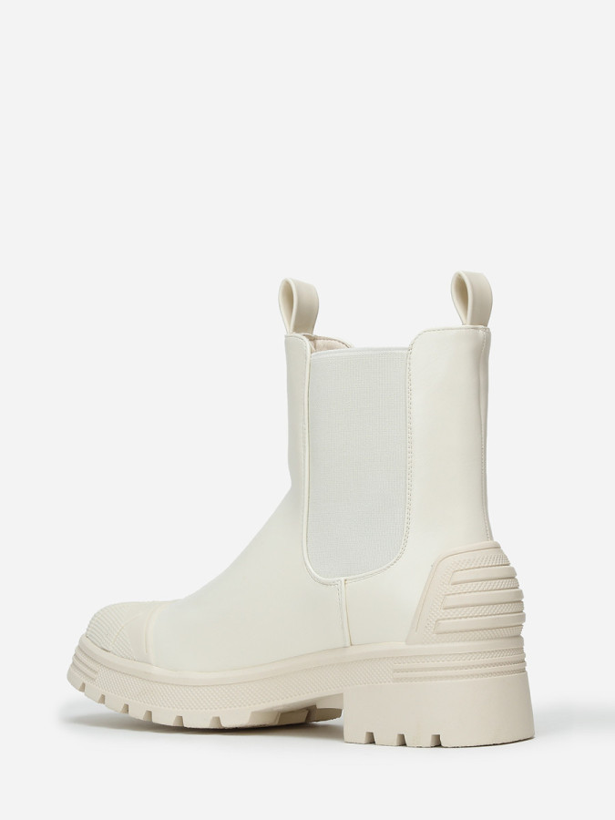 Chelsea crèmes crantées avec motifs en relief