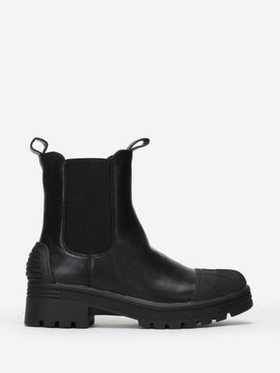 Chelsea noires crantées avec motifs en relief