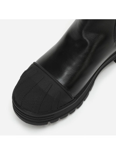 Chelsea noires crantées avec motifs en relief