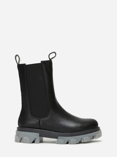 Chelsea noires avec semelle à effet translucide