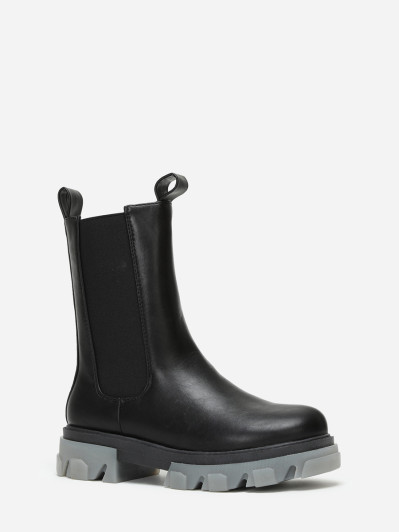 Chelsea noires avec semelle à effet translucide